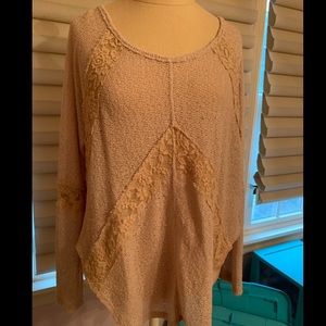 Free people sweater. Longer in back.